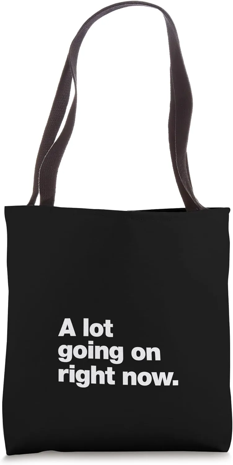 A design that says A lot going on right now. Tote Bag